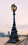 Street lamp at Victoria Embankment at Thames River in London