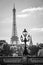 Street lantern on the Alexandre III Bridge against the Eiffel Tower in Paris