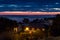 Street light, houses and sea view at sunset in Seattle, USA