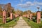 Street lights alley in Herastrau park, Bucharest, Romania. Autumn season