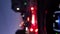 Street Lights and colorful traffic lights from the car. Night Blur Bokeh Abstract. Urban atmospheric mood. Vertical