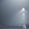 Street lights, foggy misty night, lamp post lanterns, deserted road in mist fog, wet asphalt tarmac, car headlights approaching