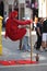 Street magician, hovering bangs who sits in the air and holds a staff