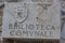 Street marble plate of the communal library, Assisi