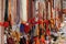 Street market shops: colored handmade necklaces on sale in the street shops in Varanasi, India. For tourtists and pilgrims