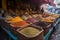 street market with a variety of spices and herbs, including saffron, turmeric, and cinnamon