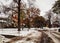 Street with messy road from snowfall