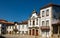 Street in Mirandela with residential houses and Church of Mercy, Portugal