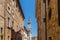 Street of Montepulciano, Italy and the Tower of Palazzo Comunale