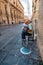 Street musician performing in Noto, Italy