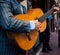 Street musician playing guitar