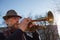 Street musician plays music