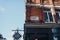 Street name sign on a building in Windmill Street in Soho, London, UK