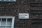 Street name sign on a side of a building on Euston Road, London, UK.