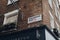 Street name sign on a wall of a building in Marlborough Court in Soho, London, UK