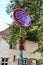 Street no parking warning traffic sign with knitting nice lovely city Riga Latvia Europe old city green trees