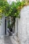 Street with old buildings in Anafiotika neighborhood in Plaka , Athens, Greece