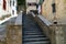 Street of Old Kotor, Montenegro Ladder with three cats waiting some food