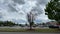Street pan of a busy shopping retail strip mall Christmas Tree Shoppes Goodwill truck parked