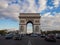 Street panorama view of historic Arc de Triomphe Etoile monument landmark traffic Champs Elysees Paris France Europe