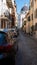 Street parking in Castel Gandolfo, summer residence of pope, view on green Alban hills overlooking volcanic crater lake Albano,