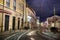 street pavement with tram railways at a stormy night empty of people in Lisbon, Portugal