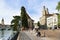 Street with people at Grossmunster Church and Wasserkirche in Zurich