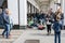 Street performer playing musical instruments at the street corner at the bank of Alster river, Hamburg, Germany