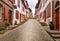 Street in perspective up the slope of town in the French Basque country. France