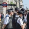 Street Photography: Group of London Policemen with Their Uniform