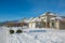 Street of residential houses in snow on winter sunny day