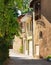 A street in a resort town on a clear sunny day. Old houses, masonry. Heat, warmth, sunshine. Beautiful picture.