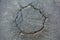 Street road asphalt surface, round crack fragment. Fracture street roadway