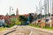 Street road and Church of Holy Maurus in Izola, Slovenia on the background