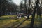 Street round white lanterns on a green lawn