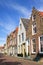 Street with row of ancient brickwork mansions, Veere, Netherlands