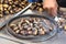 A street salesman sells freshly roasted chestnuts in Istanbul, Turkey. Turkish cuisine