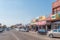 Street scene, with businesses, people and vehicles, in Middelburg