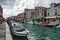 Street scene with a canal in Murano, Italy