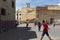 Street scene in the city of El Jadida, with young boys playing soccer football in a square on the old Portuguese City