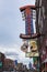 Street scene in the city of Nashville with people and neon signs at the Broadway