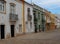 Street Scene With Colourful Houses In Tavira Portugal