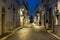 Street scene in Mattinata, on the Adriatic coast in the Gargano Peninsula, Puglia, Italy. Photographed at night in late summer.