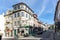 street scene in the old town of Braga with historic facades and people in early morning