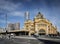 street scene outside flinders street station in central melbourne australia