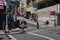 Street scene with people on a crosswalk in the Grant Avenue, at the hearth of Chinatown, in the city of San Francisco