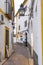 Street scene with traditional Andalucian architecture in the historical city of Cordoba, Spain