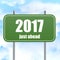 Street Sign With 2017 Just Ahead in Blue Sky