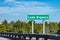 street sign of Atchafalaya Basin Bridge, Interstate 10, crossing over Lake Bigeaux. Green road sign on the concrete bridge