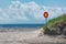 Street sign on a empty road with sea and sky in background. no entry. wrong way